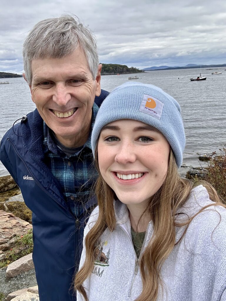 girl and dad by the water in bar harbor, maine