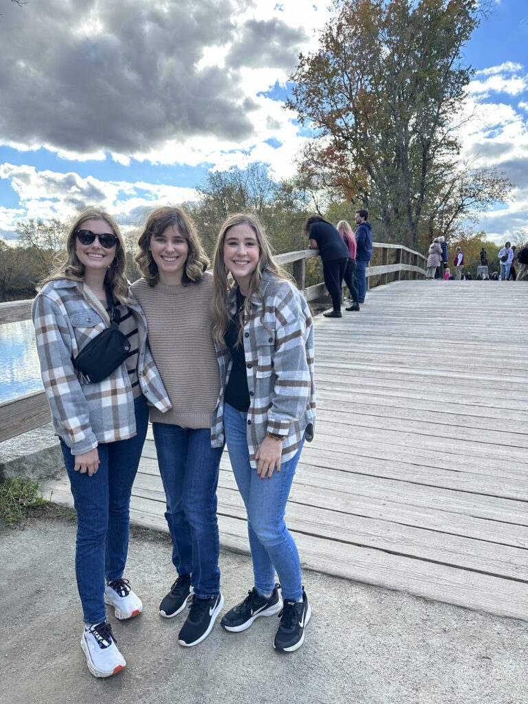 three sisters standing on the old north bridge