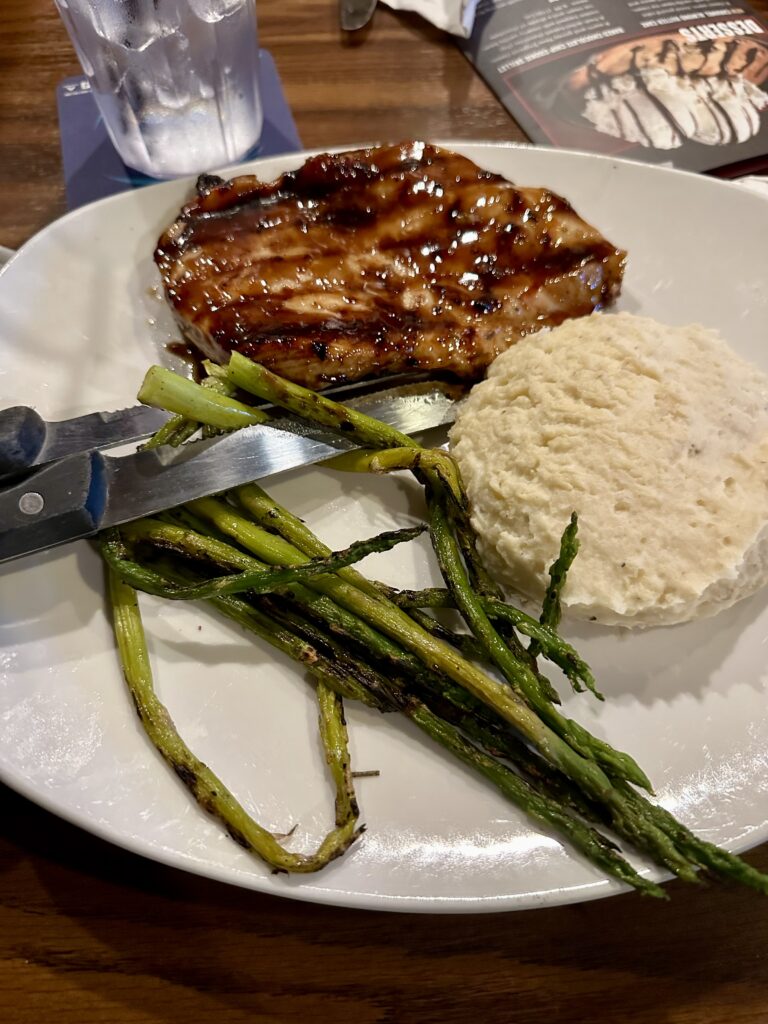 plate of chicken, asparagus, mashed potatoes from 99 restaurant in Vermont