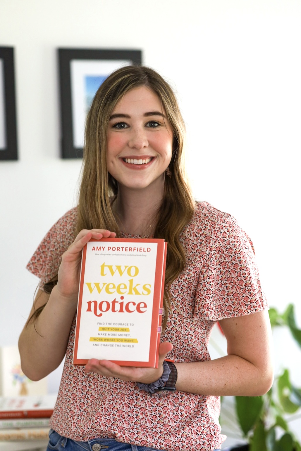 Madelyn Victoria holding Amy Porterfield Two Weeks Notice Book