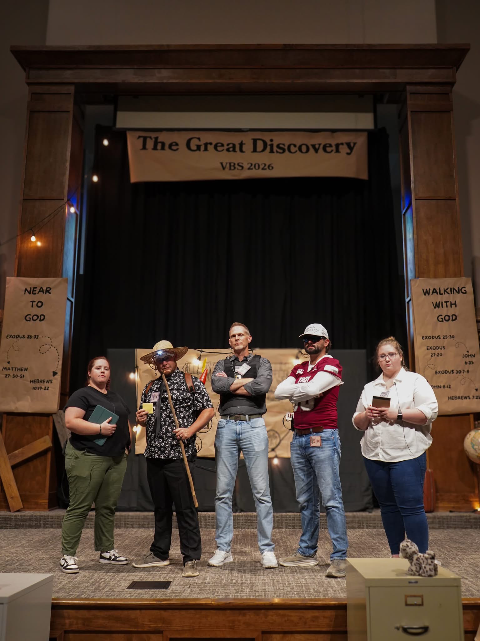 The five volunteer leaders who hosted each night of Vacation Bible School, on stage at the church.